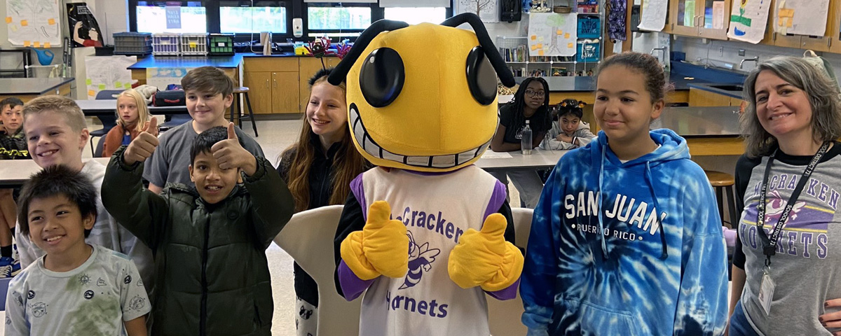Ollie the Hornet visits with students in Mrs. Eccleston's Science lab