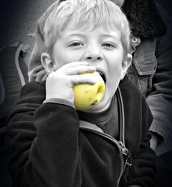 Student eating an apple